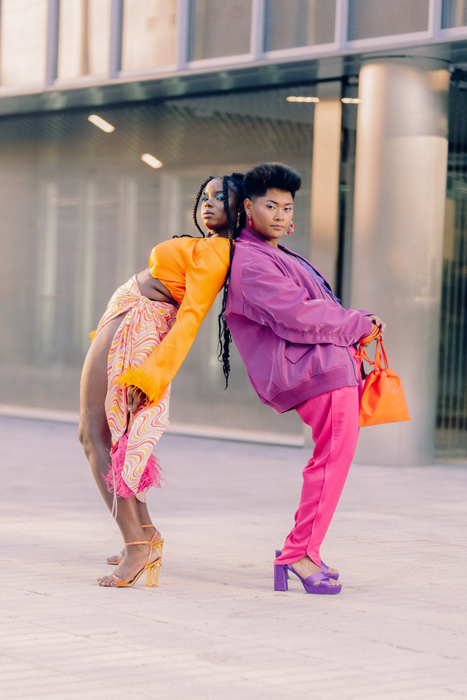 Stylish Models in Bright Clothes in the City